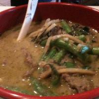 Green Curry · Bamboo shoots, green beans, bell peppers, egg plants, basil leaves and coconut milk in green...
