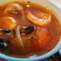 Tom Yum Noodle · Spicy pork in hot and sour noodle soup.