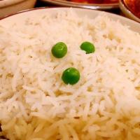 Basmati Rice · Long grain basmati rice; seasoned with cumin, bay leaf and other aromatic spices.