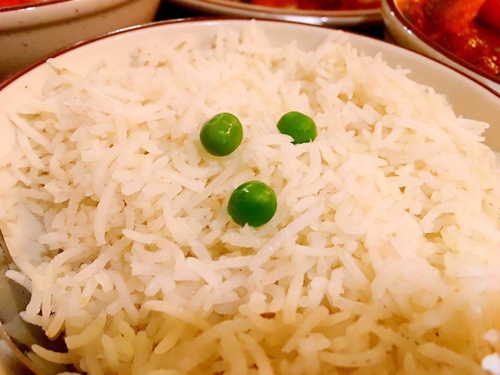 Basmati Rice · Long grain basmati rice; seasoned with cumin, bay leaf and other aromatic spices.