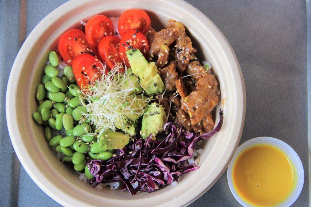 Macrobiotic Bowl · Basil soy proteins, avocado, red cabbage, cherry tomatoes, edamame, lime ginger dressing.