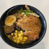 Curry Ramen · Chicken katsu, sweet corn, marinated mushrooms, served in Japanese curry chicken broth.