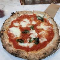 Margherita Pizza · San Marzano tomatoes, fresh Buffalo mozzarella, pecorino Romano, basil and extra virgin oliv...