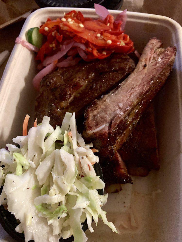 Spare Ribs · St. Louis style pork spare ribs slow-smoked for 6 hours. Served with an optional assortment of pickled veggies & slaw.