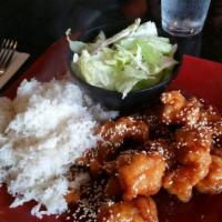 Orange Chicken · Hot. Sliced battered chicken breast meat tossed in a spicy and tangy orange-flavored sauce w...