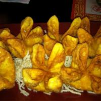 Rangoon · 8 pieces. Cream cheese and crab wrapped in golden crispy fried wonton skin.