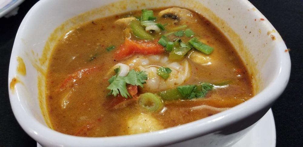 Tom Yum · Thai hot and spicy soup with mushrooms, tomatoes, red and green bell peppers, onions, baby corn, lemongrass, and cilantro. Choose chicken, tofu or shrimp.