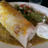 Asada Burrito · Carne asada meat wrapped up with rice, beans, onions, cilantro, and our house made lino's ho...