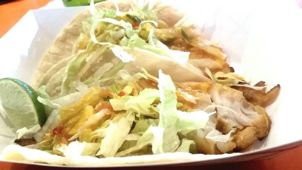 Fish Tacos · 2 pieces.