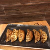 Potstickers · 8 lightly fried pork and vegetable dumplings brushed with Bonchon signature sauce. Spicy, so...