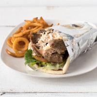 Lamb Gyro · Slices of slow roasted tender lamb gyro meat. Served in a warm pita with lettuce, tomato, on...