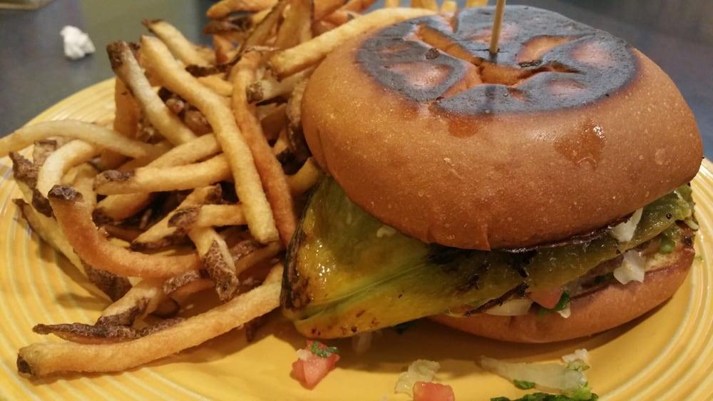 Green Chili Burger · Topped with roasted poblano pepper and melted cheese, comes with lettuce, tomato and chipotle mayo.
