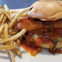 Chile Relleno Burger · Cheese burger with a full chile relleno on top. Comes with ranchero sauce.
