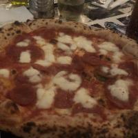 Pepperoni Pizza · Classic Pepperoni Pizza with Tomato Sauce, Mozzarella e Basil