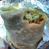 Carne Asada Burrito · Flour tortilla filled with grilled Asada, rice, beans, cheese, cilantro and onions.