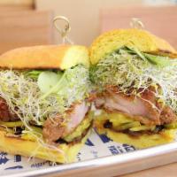 Golden Chicken Sandwich · Fried chicken on golden turmeric bun, pickled daikon, watercress, alfalfa sprouts, lemon aio...