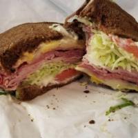 Hot New Yorker Sandwich · Pastrami, ham,  melted swiss cheese, lettuce, tomato, mayo, and mustard.