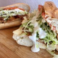 Hot Chicken Supreme Sandwich · Grilled chicken breast, bacon, pepper jack cheese, lettuce, tomato, and ranch on an Italian ...
