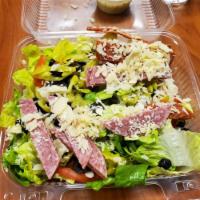 Antipasto Salad · Romaine lettuce, salami, pepperoni, red onions, black olives, pepperoncinis, tomatoes, toppe...