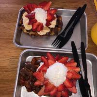 Nutella Love · Nutella, your choice of fruit and house made whipped cream, on top of our golden liege waffle.