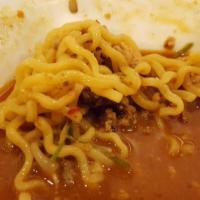 Spicy Miso Ramen · Spicy soybean paste flavored. A rich hearty spicy miso pork broth with noodles topped with s...