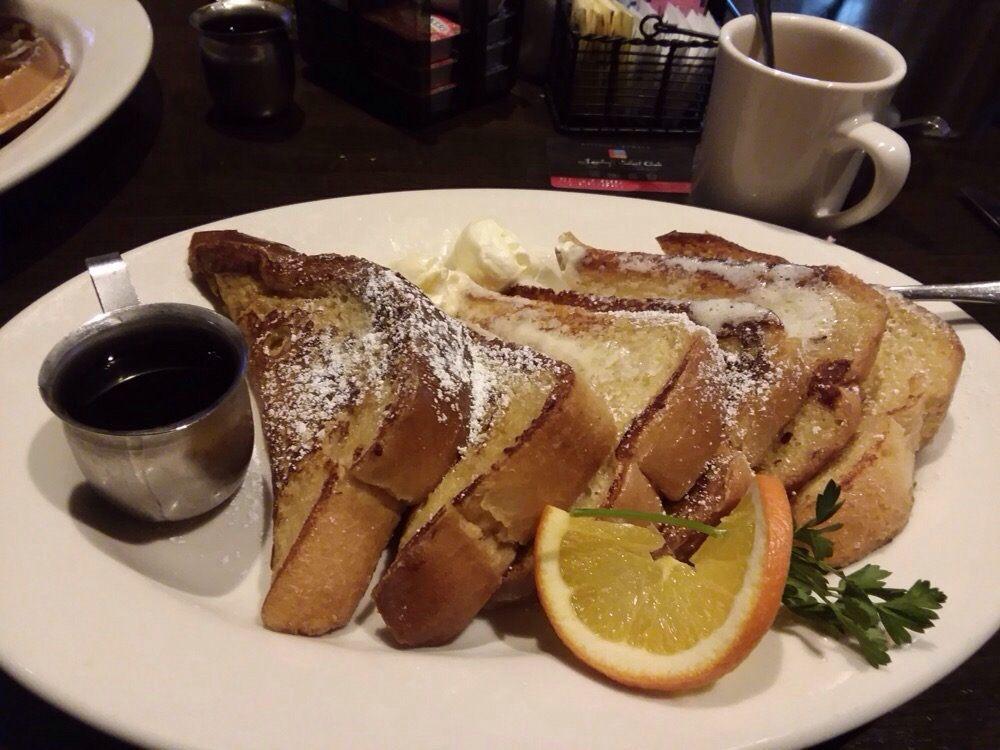 French Toast · Grilled, thick-sliced sourdough bread, sweetened cinnamon egg cream.