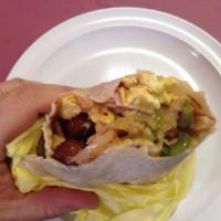 Super Breakfast Burrito · Hash browns, two eggs, cheese, bacon, sausage, ham and fajita vegetables (mushrooms, onions ...