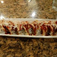 Red Roll · Raw. Spicy tuna, cucumber, and freshly fried shrimp on the inside topped with red tuna and d...