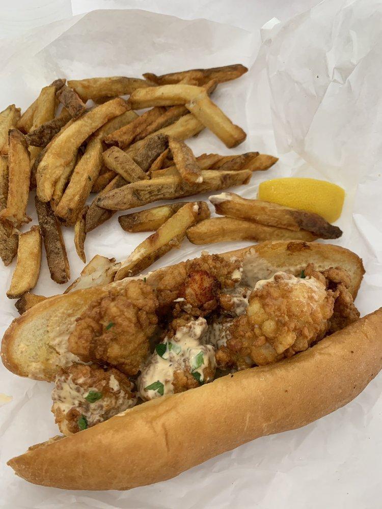 Fried Lobster Poboy Sandwich · With remoulade 'n drawn butter.