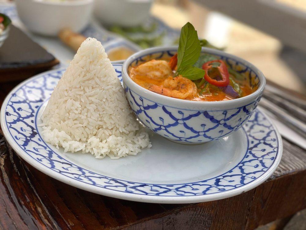 Red Curry · Bamboo shoot, Eggplant, string beans and basil leaves with coconut milk. Served with jasmine rice. Spicy. Gluten free.