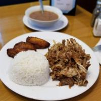 Lechon Asado · Roasted pork. Served with white rice and 2 sides.