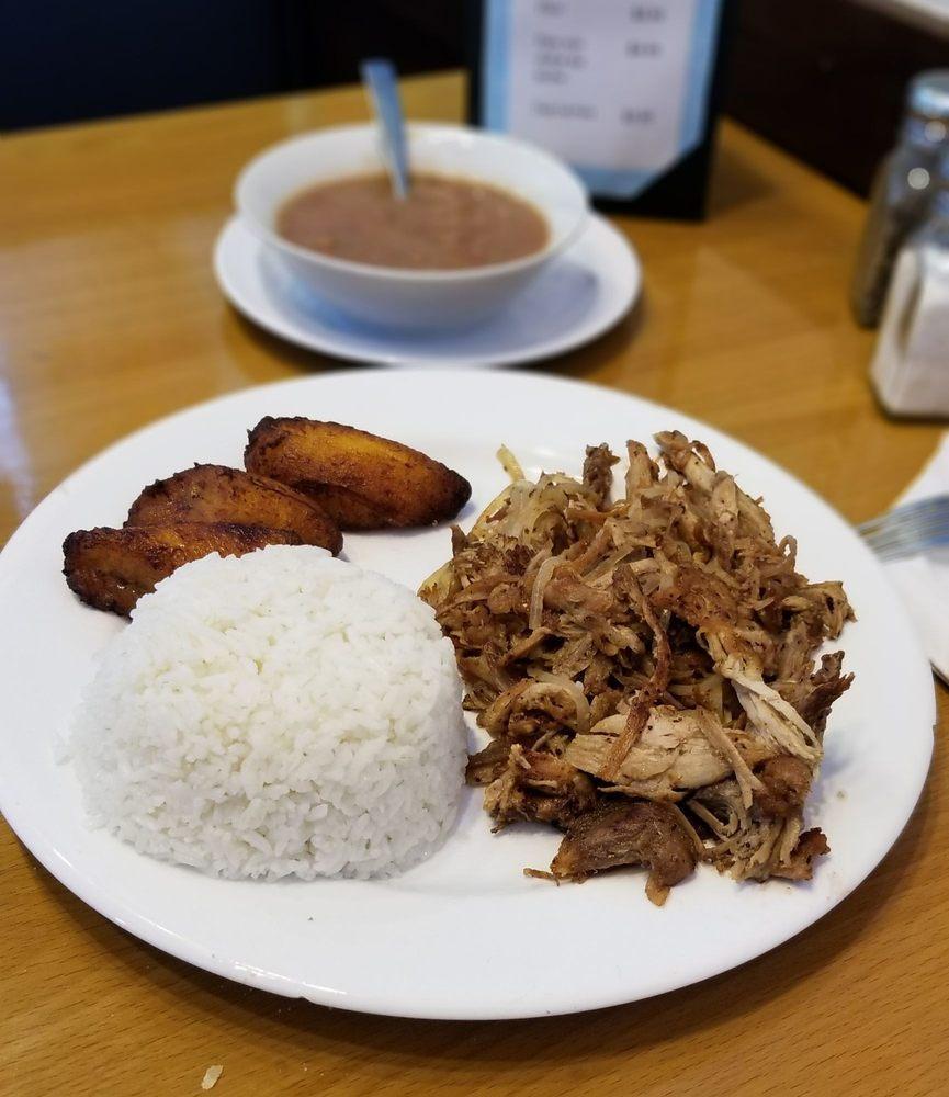 Lechon Asado · Roasted pork. Served with white rice and 2 sides.