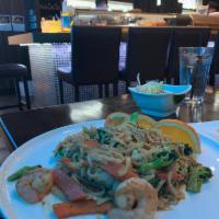 Drunken Noodle · Choice of chicken, beef or shrimp, stir fried with southeast Asia's broad noodles. Served wi...