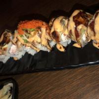 Broadway Roll · Shrimp tempura, crab salad, top with avocado, BBQ eel, sesame seed, green onion and sauce.