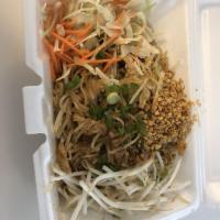 Pad Thai · Thin rice noodles stir fried with egg, bean sprouts, ground peanuts, green onions and a slic...