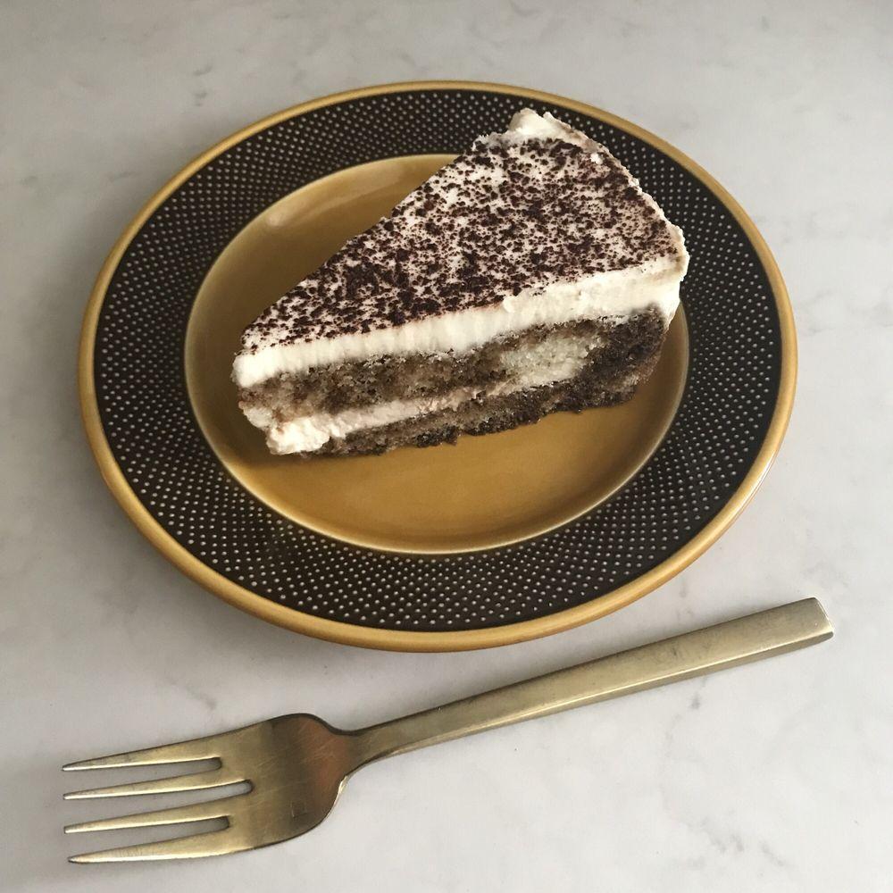 Tiramisu · Coffee soaked cake with chocolate and mascarpone cheese. A coffee-flavored Italian dessert. It is made of ladyfingers (savoiardi) dipped in coffee, layered with a whipped mixture of eggs, sugar, and mascarpone cheese, flavored with cocoa.