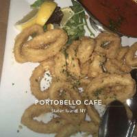 Large Fried Calamari · Served with a choice of zesty basil tomato sauce, a spicy Asian cherry pepper sauce or a tan...