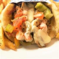 Chicken Fajita Hot Sandwich · Served in pita bread, with green peppers, tomato, onion, jalapenos and American cheese.