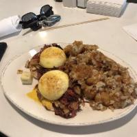 The Cherry Creeker · Our slow-cooked award-winning corned beef hash topped with 2 poached eggs and hollandaise sa...