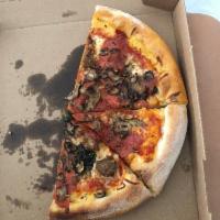 Mushroom Pepperoni Sausage Pizza · Cremini mushrooms, rustic pepperoni, spicy Italian sausage, fresh torn basil, mozzarella and...