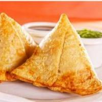 2 Piece Vegetable Samosa · A fried pastry with a savory potato filling.