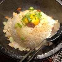 Garlic Fried Rice Bowl · Our Garlic Fried Rice features white rice stir-fried with egg yolk, sliced onions, sliced ga...
