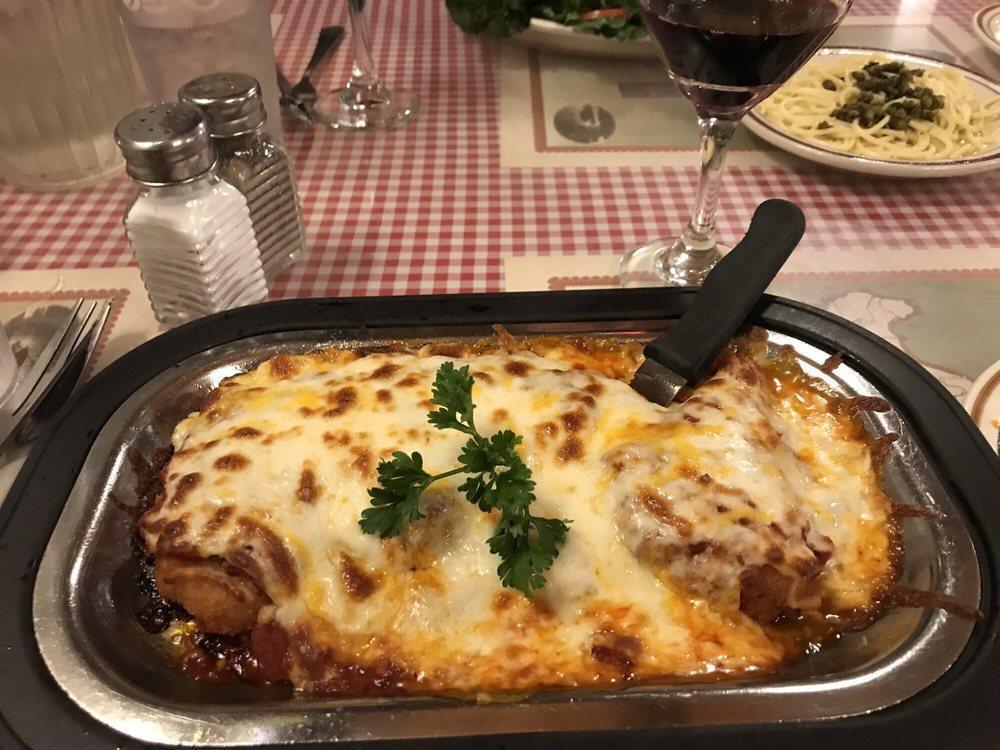 Chicken Parmigiana · Baked boneless chicken breast covered in a meatless red sauce and our own blend of cheeses.