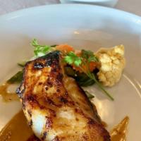 Miso Chilean Sea Bass · Served with pickled vegetables, steamed white rice or steamed coconut milk ginger brown rice...