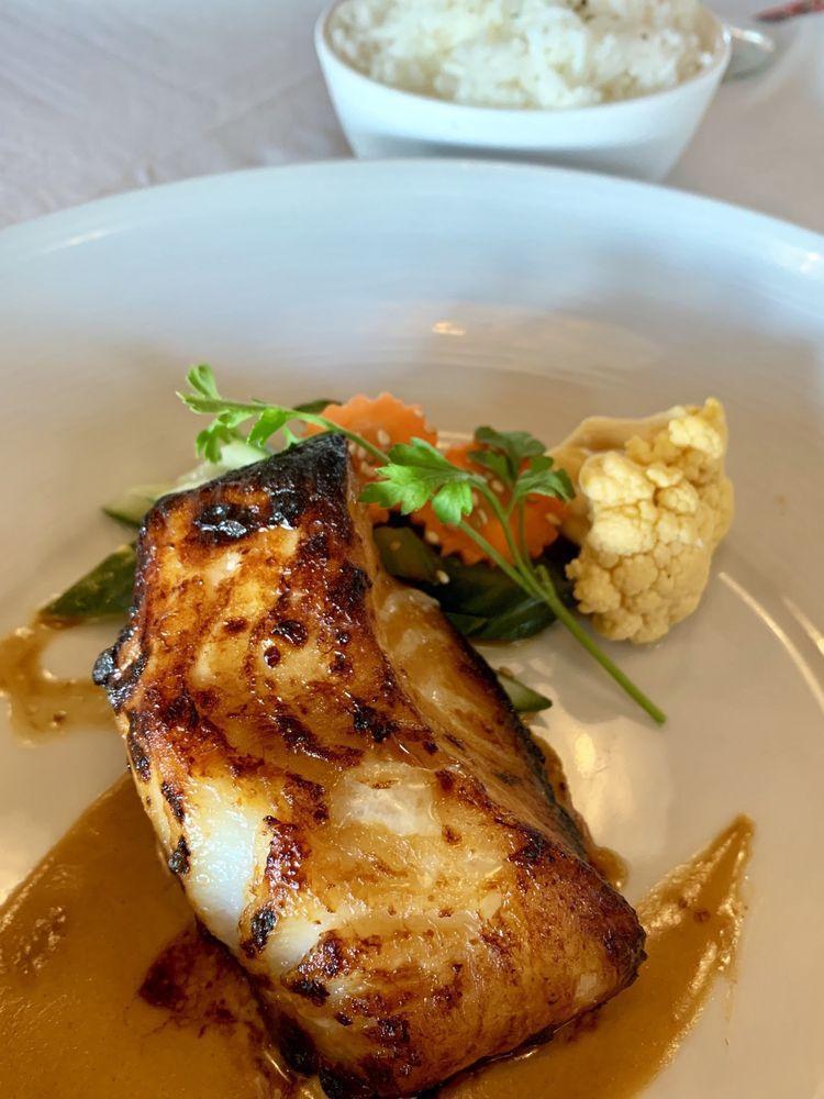 Miso Chilean Sea Bass · Served with pickled vegetables, steamed white rice or steamed coconut milk ginger brown rice. Gluten free.