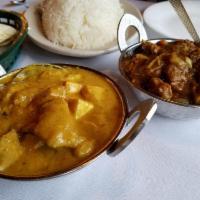 Chicken Shahi Korma · A royal dish of chicken cooked with chunks of homemade Indian cheese in creamy sauce, garnis...