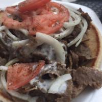Gyros · The best! Seasoned sliced lamb and beef, tomatoes, onions and our homemade gyro sauce served...