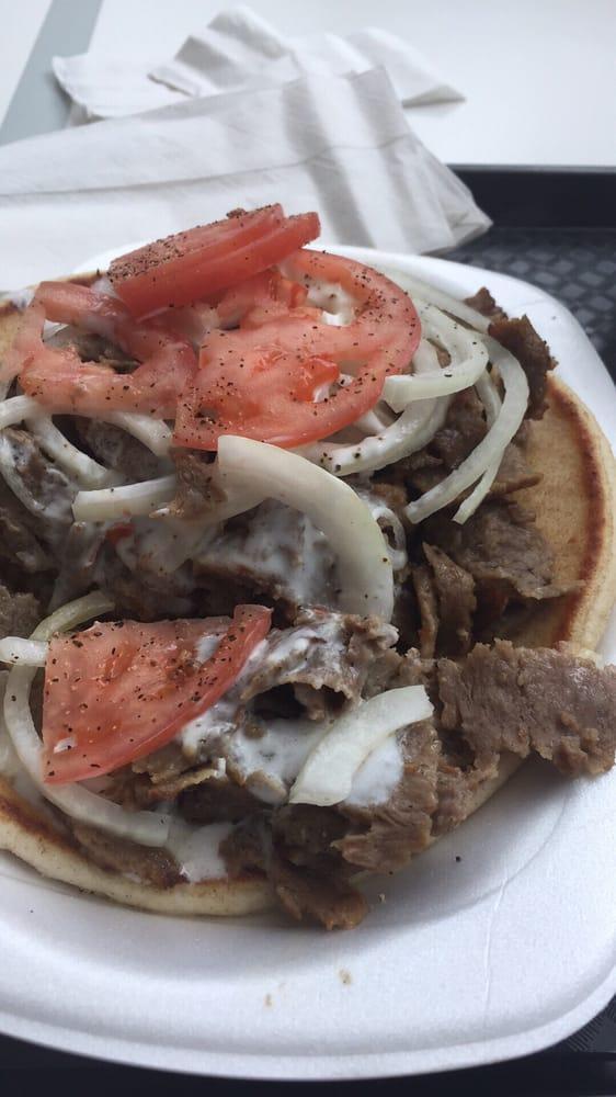 Gyros · The best! Seasoned sliced lamb and beef, tomatoes, onions and our homemade gyro sauce served in a grilled pita. 