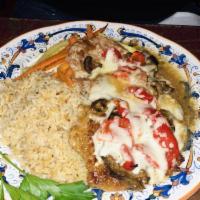Provimi Veal Ankara · Pan seared tender veal topped with grilled eggplant, roasted red peppers and melted mozzarel...