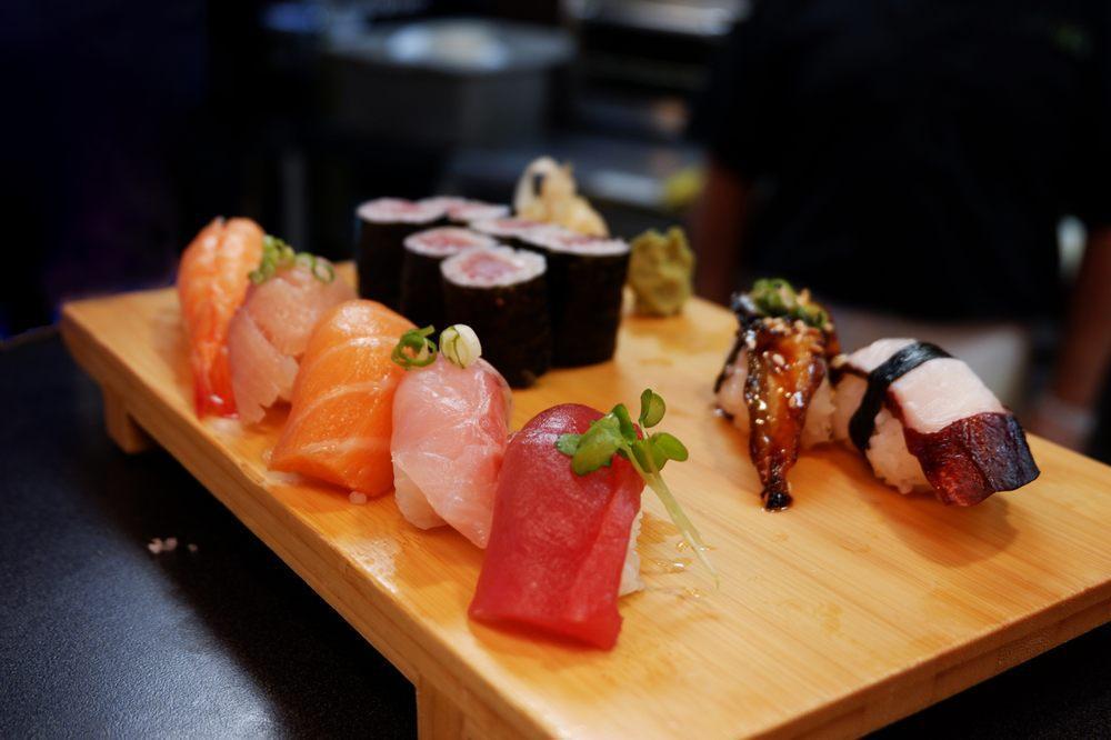 Sushi Combo · Sushi (7 pieces): tuna, salmon, yellowtail, white fish, shrimp (ebi), unagi, octopus and tuna roll. Served with miso soup.